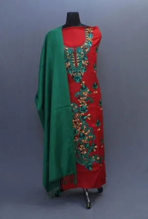 Green And Maroon Color Suit Having Aari Embroidery On Neck Bold Bail Pattern And Beautiful Motifs