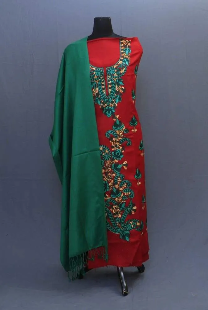 Green And Maroon Color Suit Having Aari Embroidery On Neck Bold Bail Pattern And Beautiful Motifs